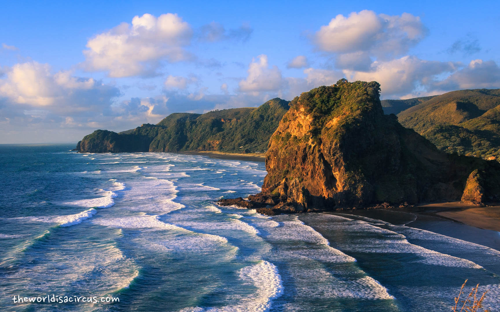 Last light of the day touching Piha Beach, New Zealand